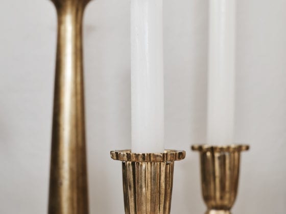 A set of three candles of different heights