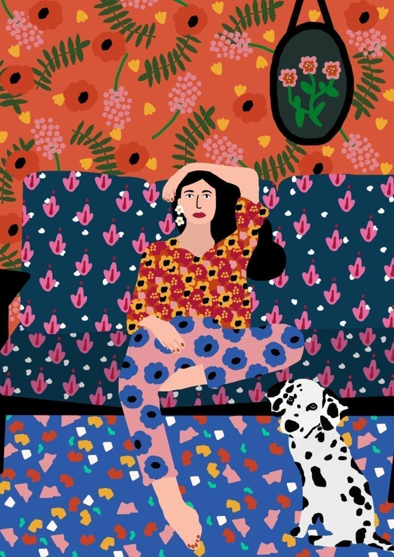 An illustration of a woman seated on her sofa with her Dalmatian seated on the floor in front of her