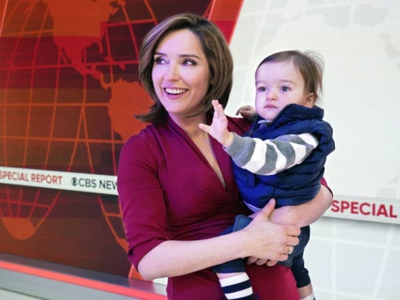 A woman holding her son at a news recording studio