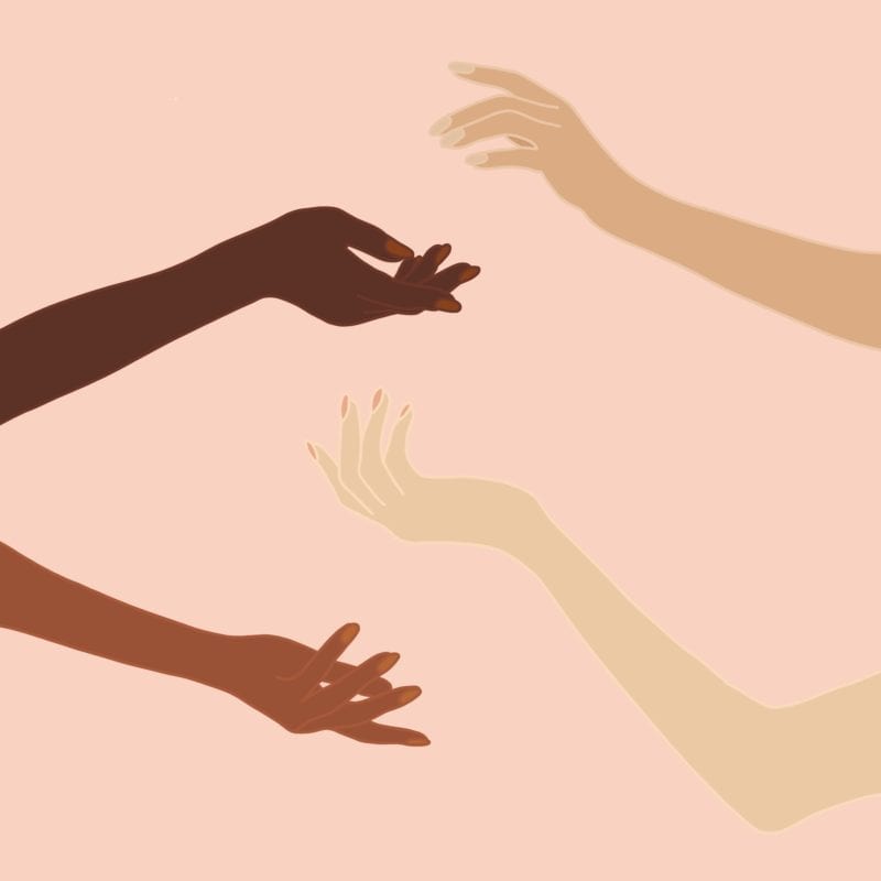 An illustration of arms of people of different races reaching out